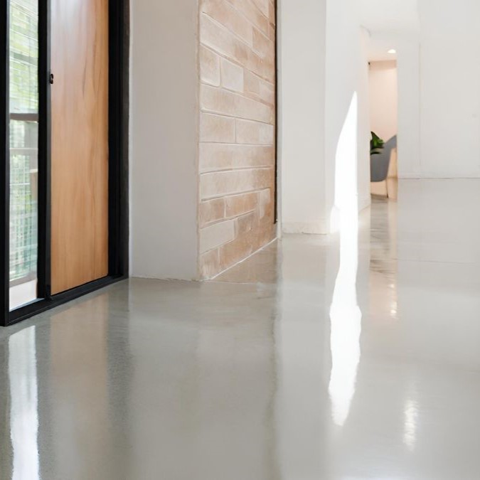 In situ concrete flooring for a residential hallway.